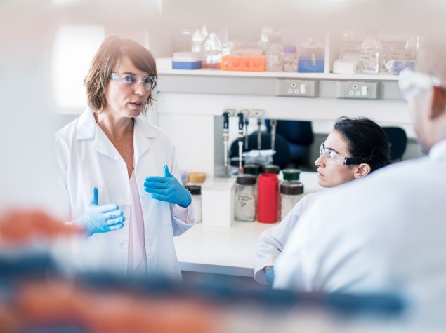 Scientists discussion in lab